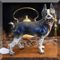 C09. Cast iron dog doorstop. 